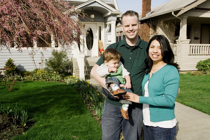 couple in front of houses_small for success page